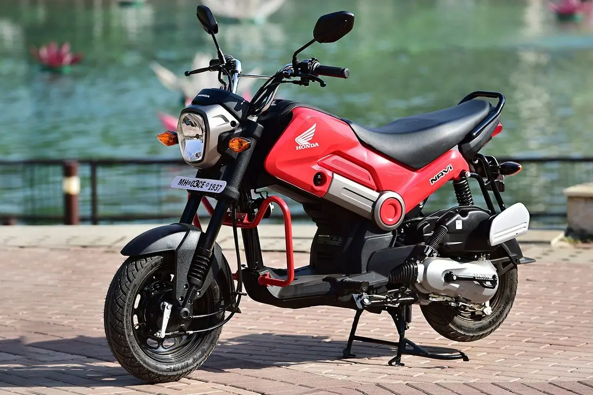 Tampilan depan dan samping Honda Navi 2026 bergaya mini bike dengan desain unik dan bodi mungil