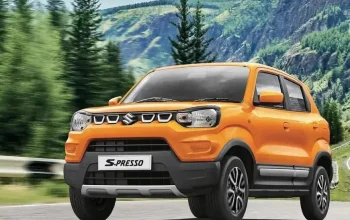 Tampilan depan dan samping Suzuki S-Presso terbaru dengan desain bodi tegak dan pelek alloy 14 inci